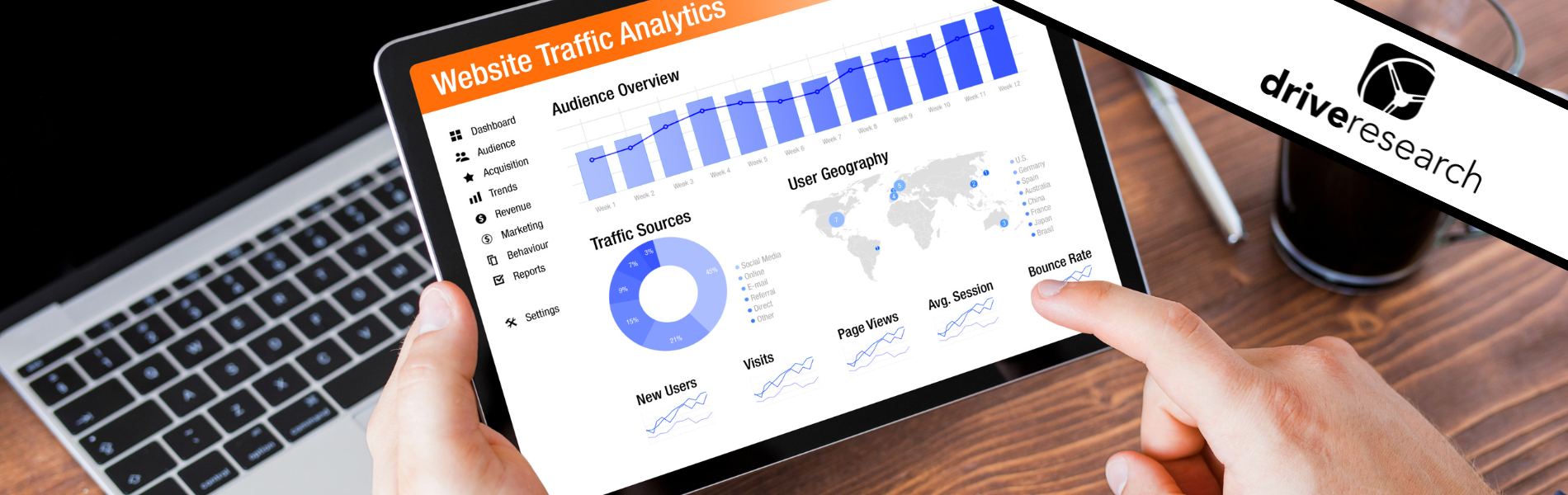 Man Viewing Website Traffic Analytics Data on Tablet Computer