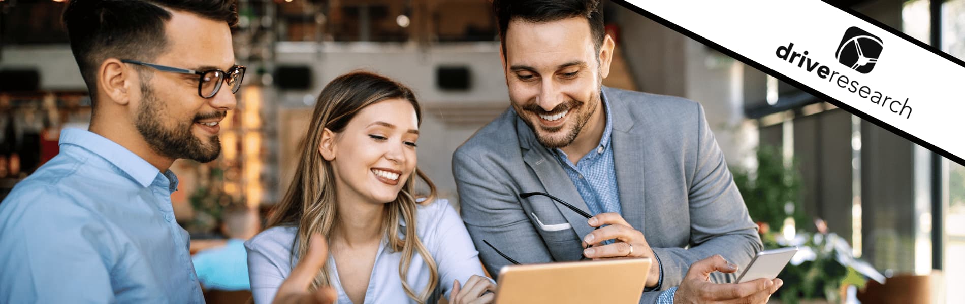 Employees looking at tablet