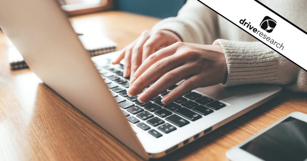 Woman's hands working on laptop