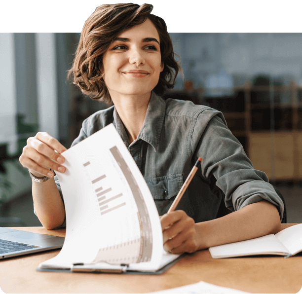 Woman signing a paper