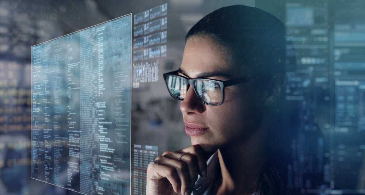 Woman looking at virtual screens