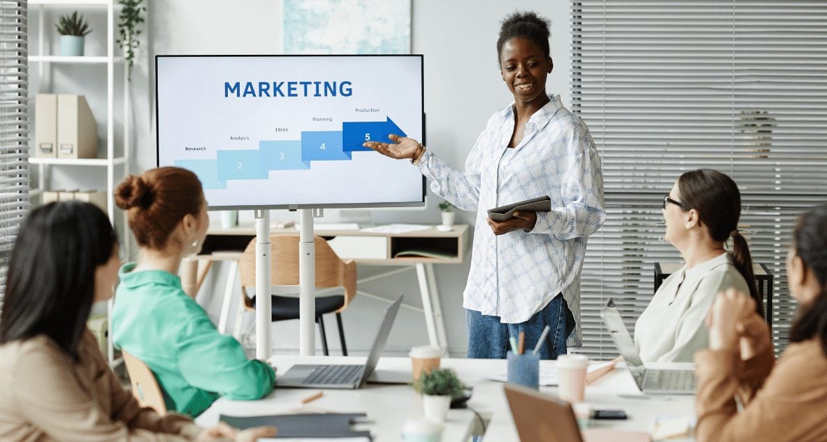 Group of employees viewing a marketing presentation