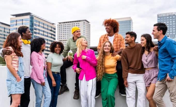 Group of friends with different demographics on a rooftop