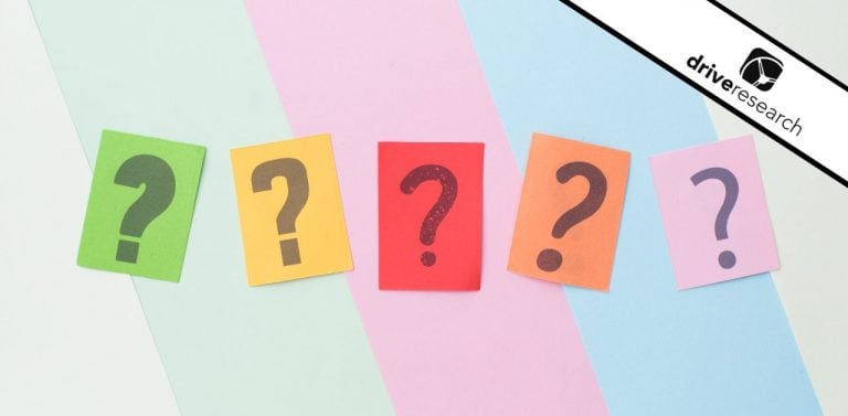 Question marks on colorful pieces of paper and background