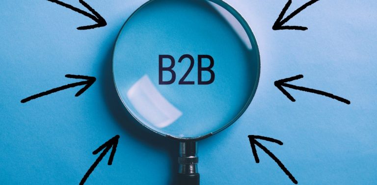 Magnifying glass over the word "B2B"