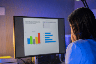 Woman looking at quantitative market research data on a computer