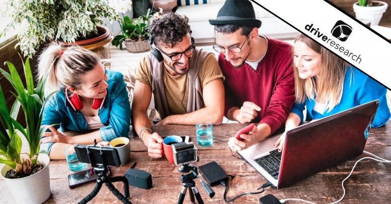 male and female content creators at at coffee shop