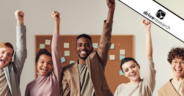 Male and female employees cheering