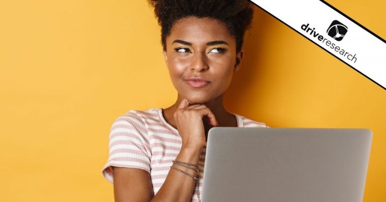 Black woman thinking in front of an orange background