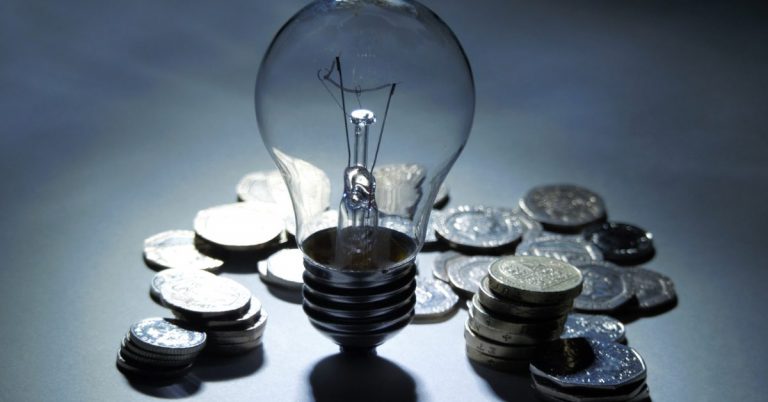 Light bulb and coins