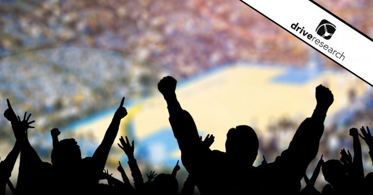 Fans cheering at basketball game