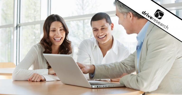 Financial services employees at laptop