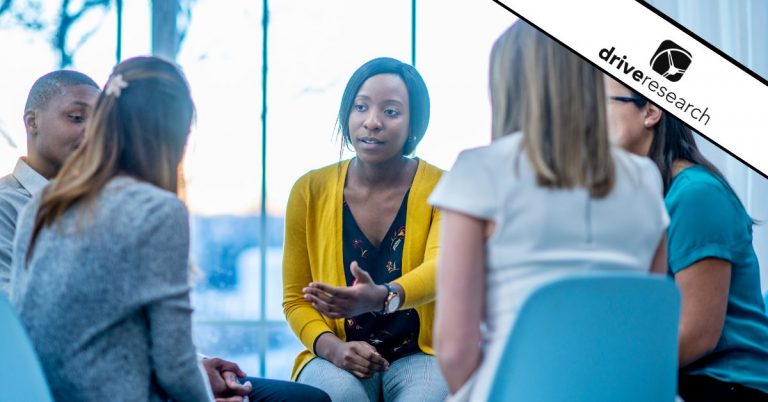 a group talking with each other showing the advantages of focus groups