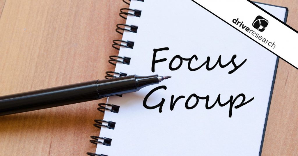 a pen and paper showing the top 10 focus group ground rules