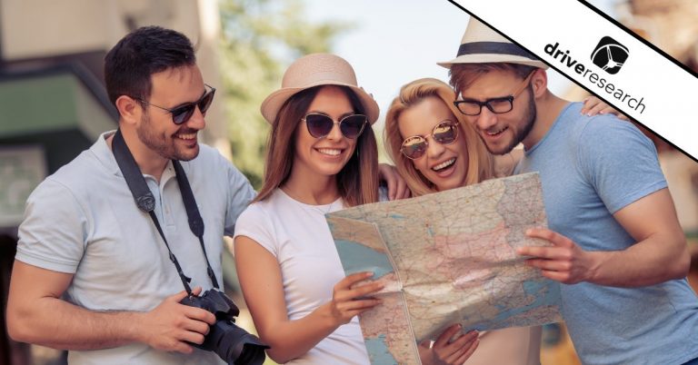 a tour group looking at a map showing a possible tourism survey questionnaire being answered