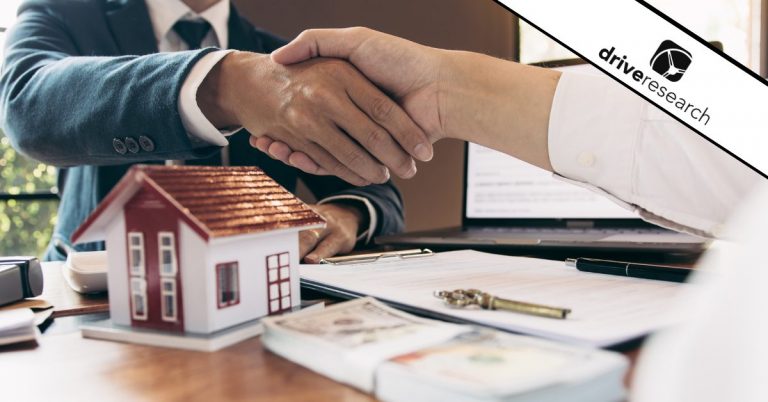 A real estate market research transaction about condos with two people shaking hands over a contract