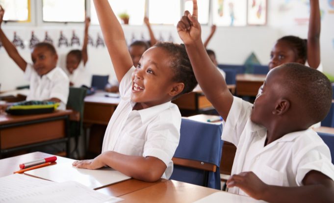 Kids Raising Hands during Elementary School