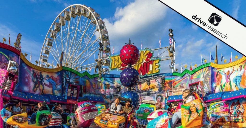 Image of fair during the summer with shot of ferris wheel