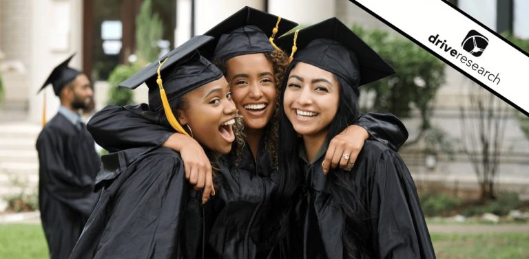 Three women in graduation cap and gown - Drive Research