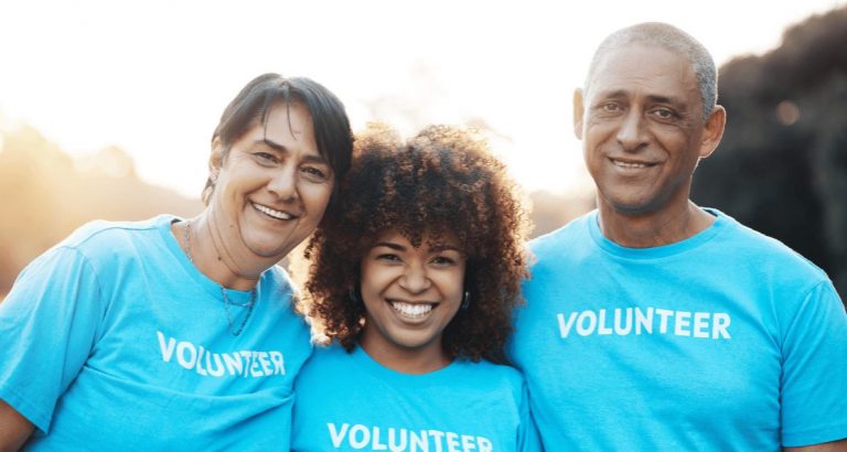 Volunteers smiling