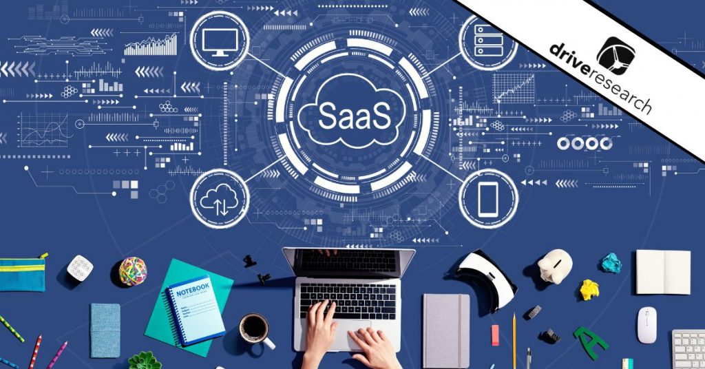 SaaS symbols with hands on laptop