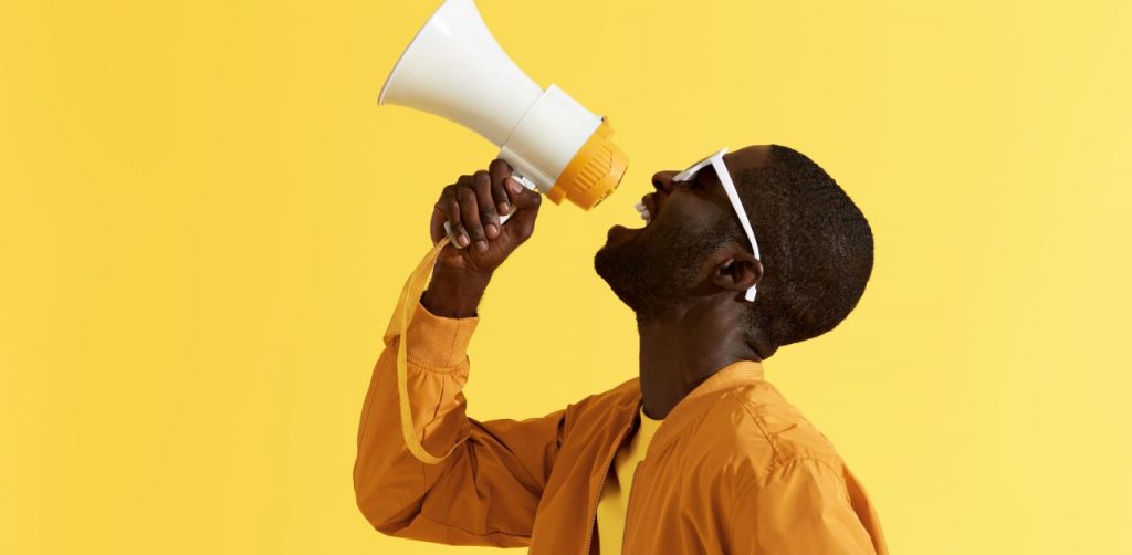 Man speaking into megaphone