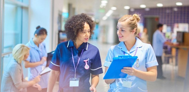 Nurses walking through hospital