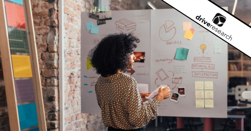 a girl using a mood board for market research